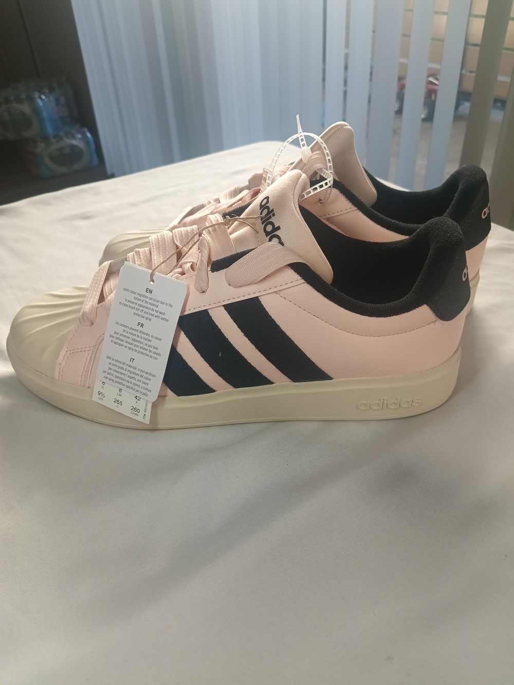 Adidas Women’s Pink Shell Toe Sneakers with Black Stripes